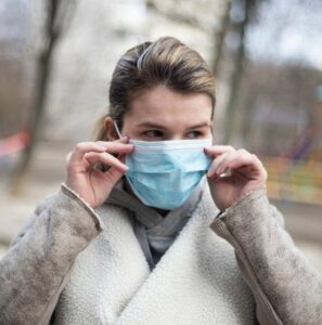 photo of lady wearing a face mask