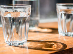 3 glasses of water on a table